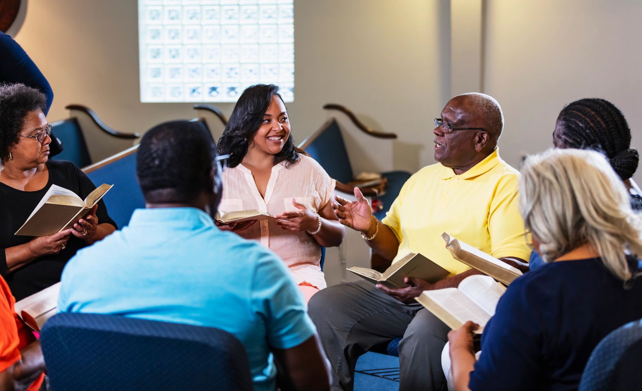 Church leaders gathered in a collaborative discussion